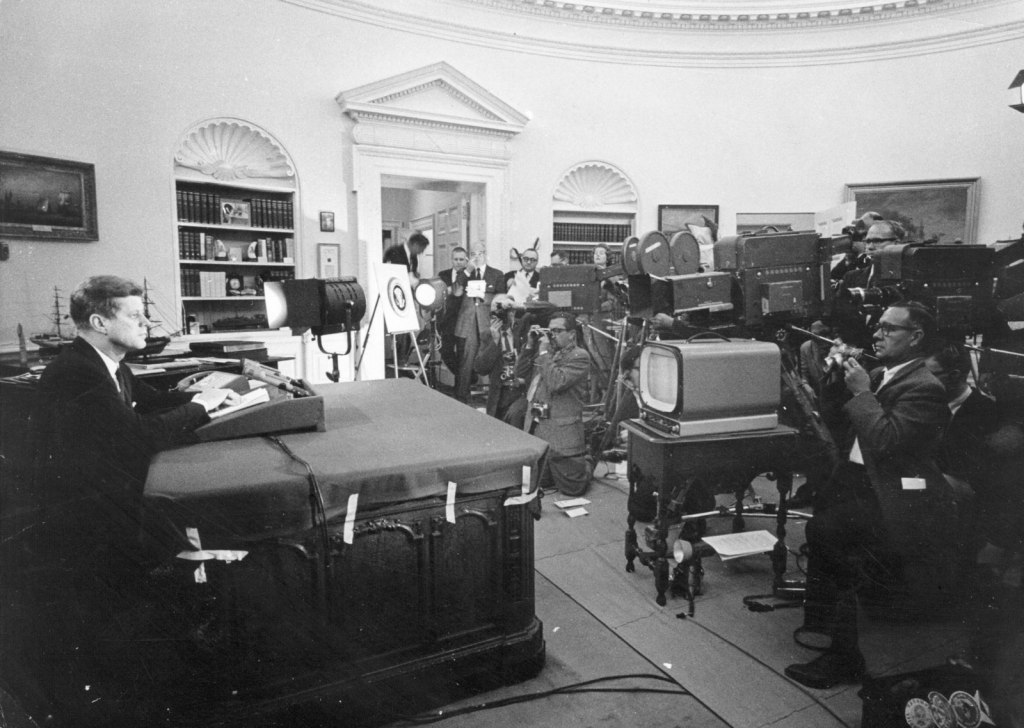 A photo of JFK right before the cameras go live, October 22, 1962.