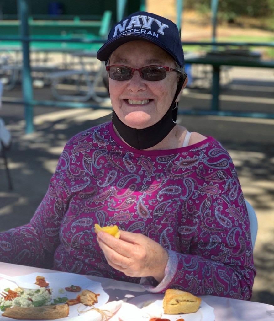 Veteran at Yountville enjoys a meal outdoors.