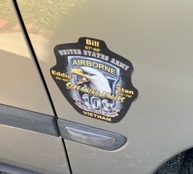 Symbol of the 101st Airborne Screaming Eagle with names of his brothers on it.