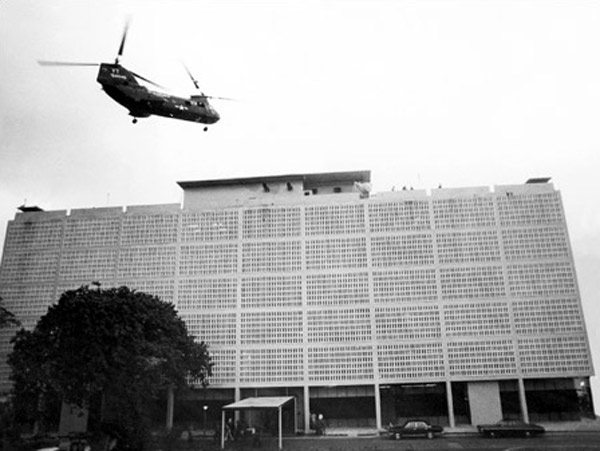 A helicopter lands on the roof of the embassy in Saigon. 
