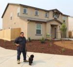 Veteran take possession of two story beige home sits on corner lot in Merced.