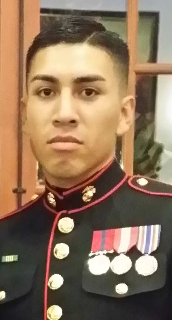 Proud Marine in dress uniform.