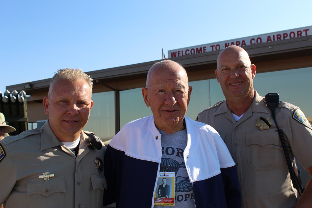 U.S. Army Air Force veteran Waldo Molina with a few guys from the CHP escort.