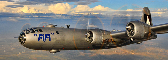 A B-29 bomber flying over the central valley of California.