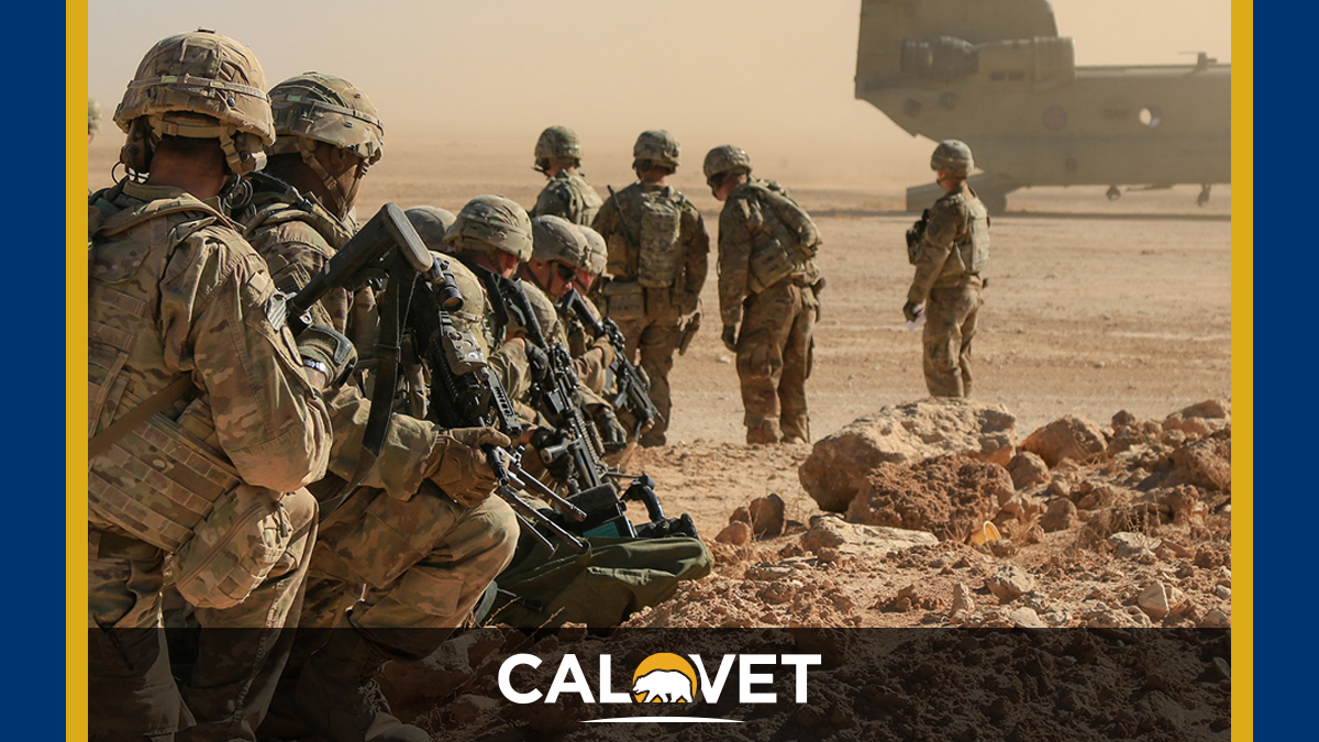 Soldiers assigned to the 1st Squadron, 3rd Cavalry Regiment, await extraction via a CH-47 Chinook, Al Asad Air Base, Iraq.