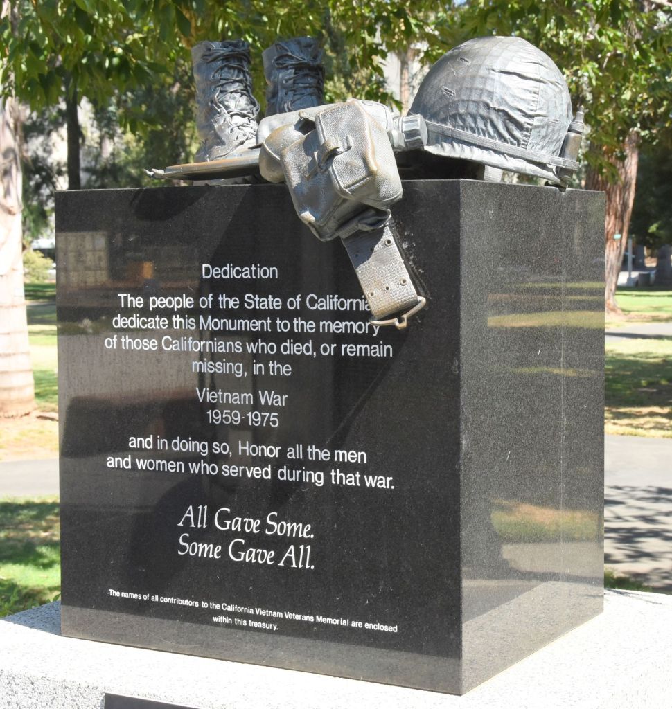 Photo of the dedication plaque from the California Vietnam Veterans Memorial in Sacramento’s Capitol Park. Verbiage ends in... All Gave Some, Some Gave All.