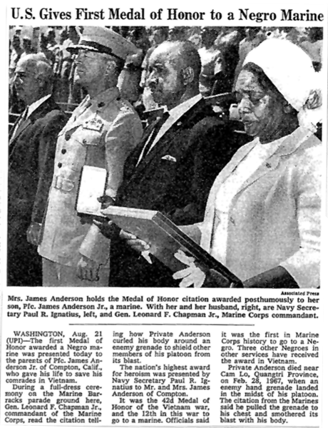 Newspaper clipping from the New York Times, 1968, Mrs. James Anderson holds the Medal of Honor citation awarded posthumously to her son.