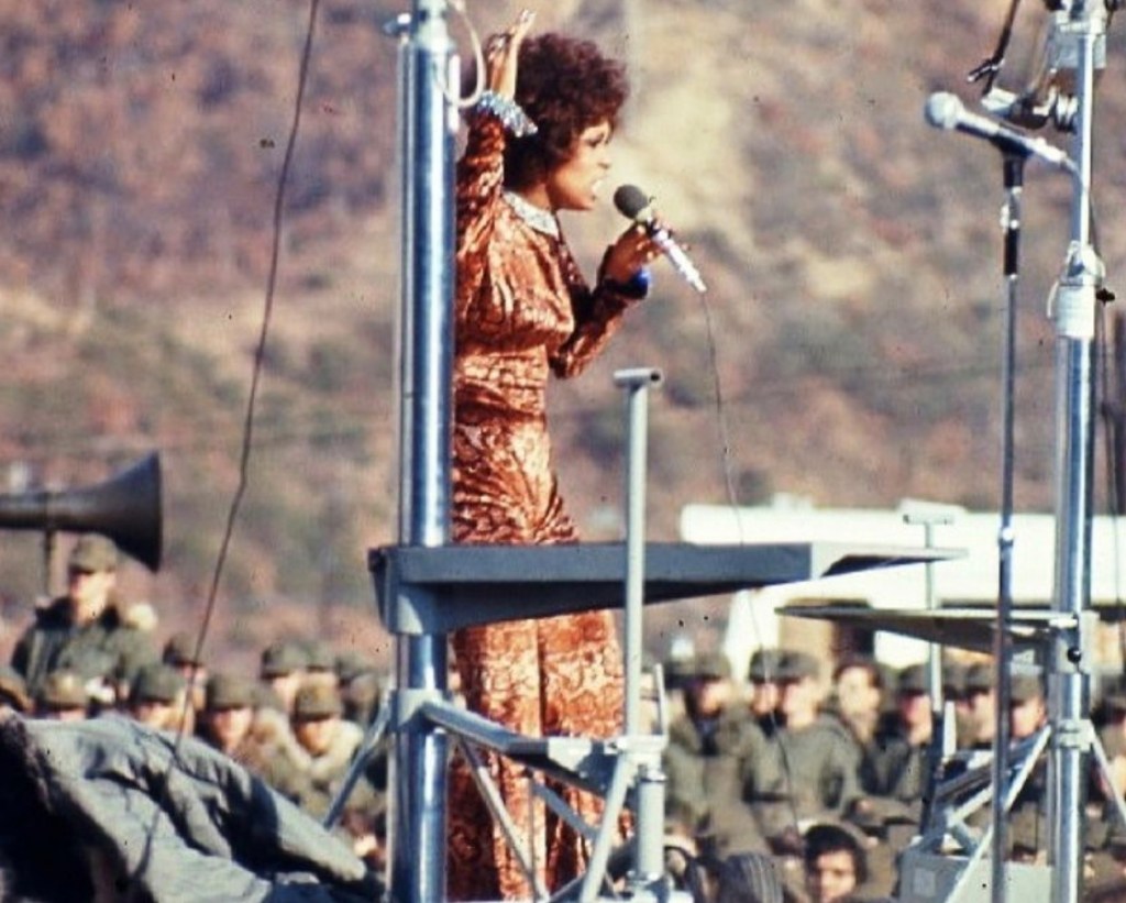Lola Falana, with her mic in her hand, performs for the troops in Vietnam on Bob Hope's final foreign USO Tour, 1972.