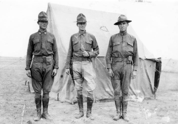 BW photo of three soldiers standing next to a tent in San Luis Obispo, 1917