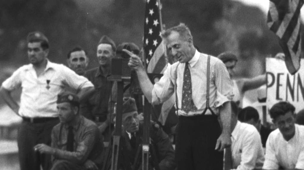Retired Marine Major General Smedley Butler addresses the camp.