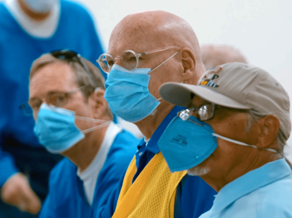 Incarcerated veterans attend a benefits meeting.