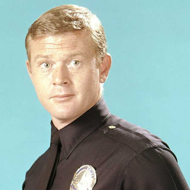 Headshot of Martin Milner in police uniform.