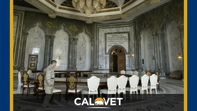 A soldier walks in one of Saddam Hussein’s former palaces.