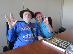 John and Bjo Trimble doing the Star Trek Vulcan hand salute..