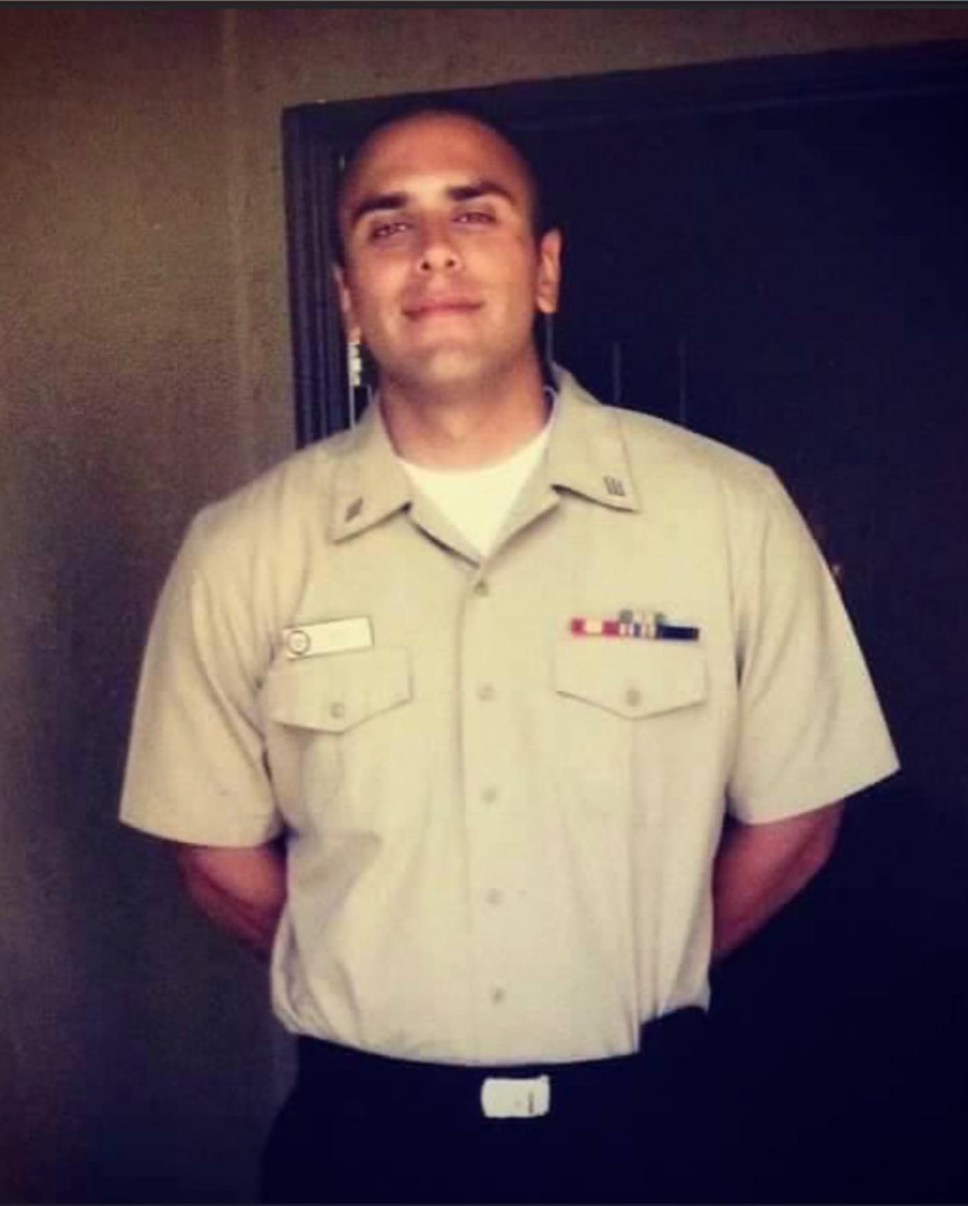 Veteran Derek Rose in U.S. Navy uniform.