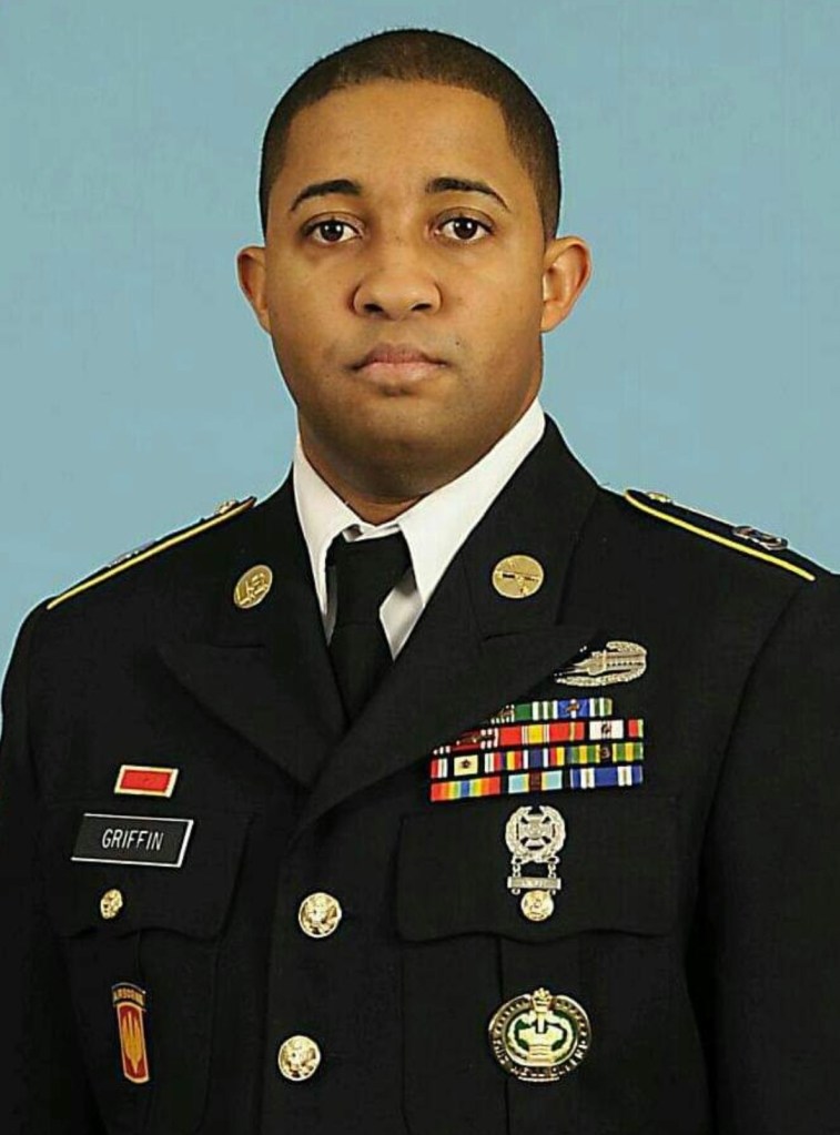 Army soldier in dress uniform.