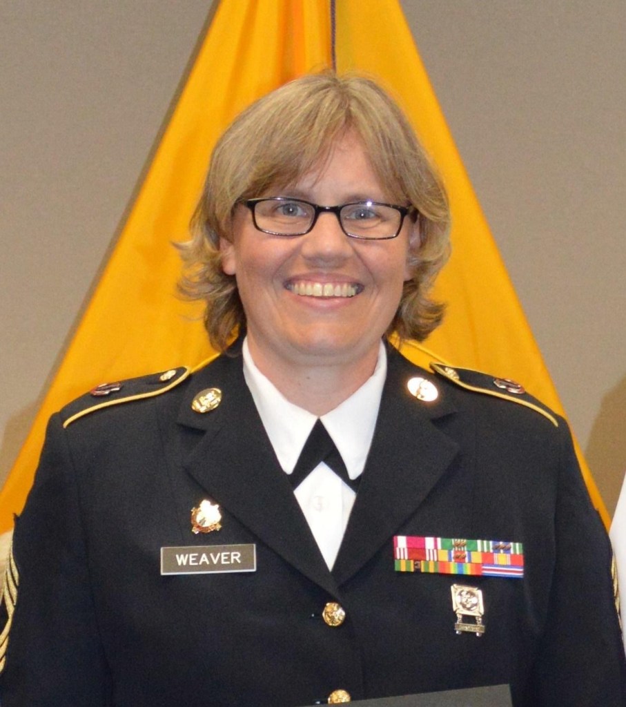 Servicemember in Army National Guard uniform.